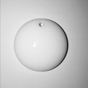 White pendants in various shapes